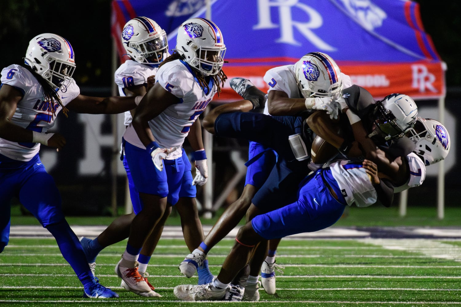 Martell Moore and Josh Brown, for Peachtree Ridge, stop Norcross. (Jamie Spaar for the Atlanta Journal Constitution)