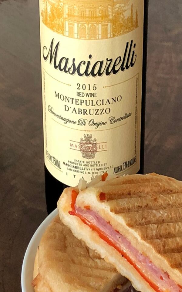 Masciarelli Montepulciano D'Abruzzo paired with a DeVitis eggplant panini on April 23, 2018, in Akron, Ohio. (Phil Masturzo/Akron Beacon Journal/TNS)