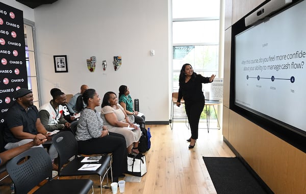 Xamayliz Gonzalez, senior business consultant, speaks to participants during educational workshops to enhance their financial health and understanding of business finances at Summerhill Chase Community Center Branch, Tuesday, March 26, 2024, in Atlanta. The Atlanta Hawks and Chase are launching a new community program for aspiring entrepreneurs who have left the justice system. (Hyosub Shin / Hyosub.Shin@ajc.com)