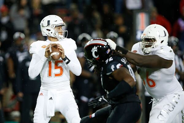 CINCINNATI, OH - OCTOBER 1: Brad Kaaya #15 of the Miami Hurricanes looks to pass in the second half against the Cincinnati Bearcats at Nippert Stadium on October 1, 2015 in Cincinnati, Ohio. Cincinnati defeated Miami 34-23. (Photo by Joe Robbins/Getty Images)