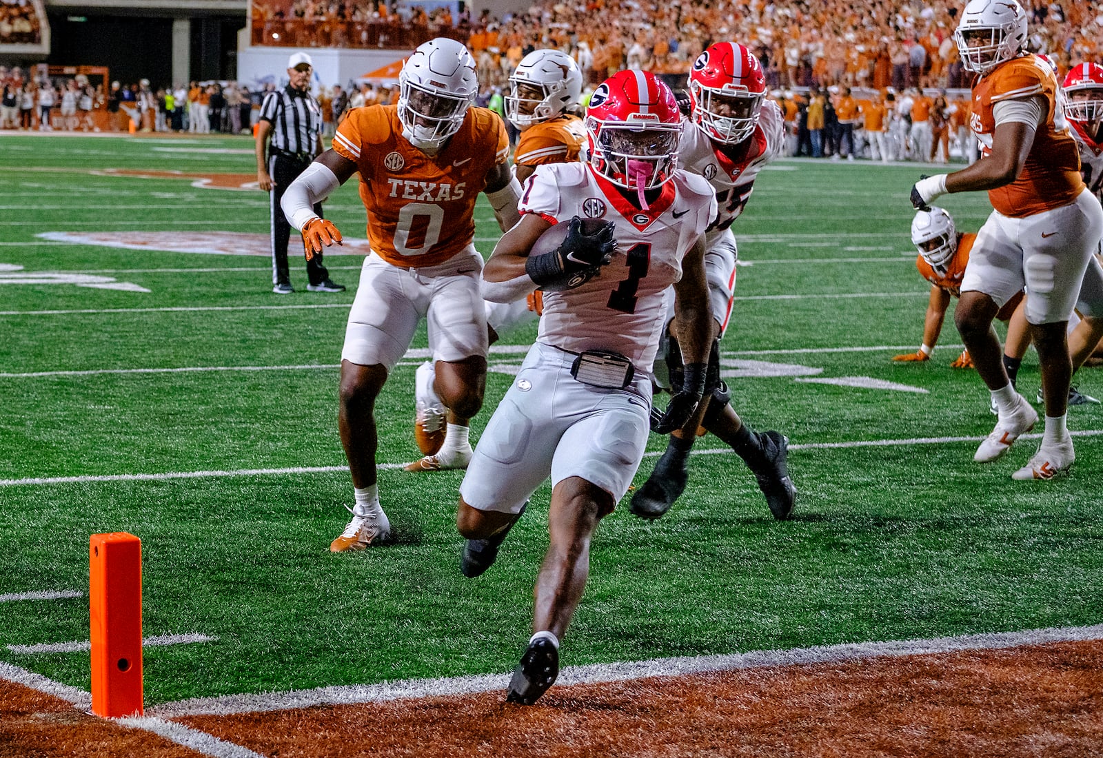 Georgia running back Trevor Etienne (1) runs into the end zone for a touchdown against Texas during the first half of an NCAA college football game in Austin, Texas, Saturday, Oct. 19, 2024. (AP Photo/Rodolfo Gonzalez)