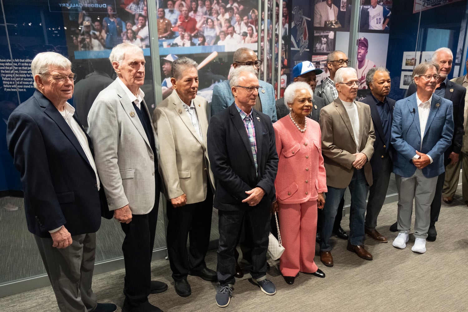 Billye Aaron poses for a photo with members of the 1974 Braves team before the opening of the Atlanta History Center exhibit “More Than Brave: The Life of Henry Aaron” on Monday, April 8, 2024.   (Ben Gray / Ben@BenGray.com)