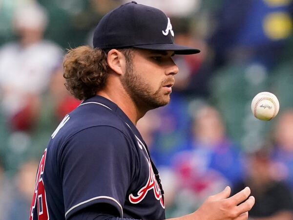 Braves starting pitcher Bryse Wilson tosses the ball during the first inning Sunday, April 18, 2021,  against the Chicago Cubs at Wrigley Field in Chicago. (Nam Y. Huh/AP)