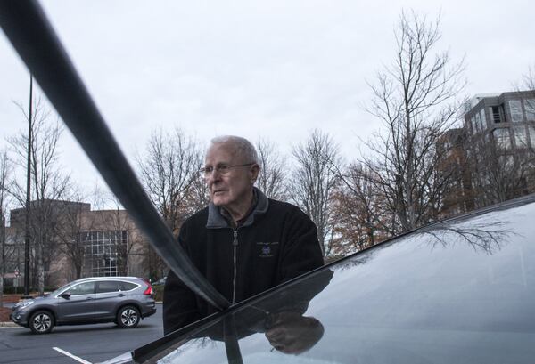 12-27-17 - Atlanta, GA - Henry Haake pumps gas at a Costco gas station in Atlanta, Georgia, on Wednesday, Dec. 27, 2017. (CASEY SYKES, CASEY.SYKES@AJC.COM)