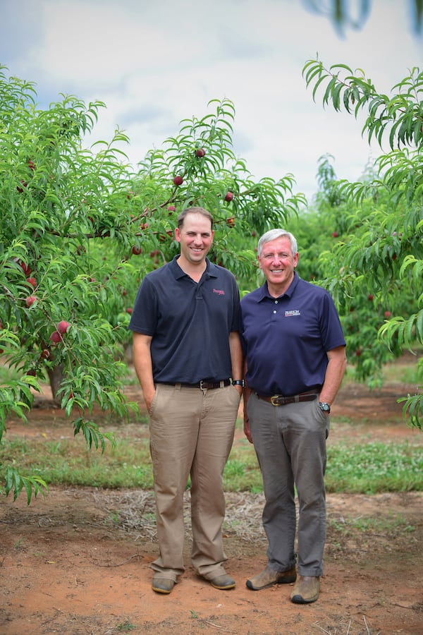 Al Pearson (right) and his son Lawton are the farmers of Pearson Farm in Ft. Valley, Georgia. (Photo credit: Moorman Photographics)