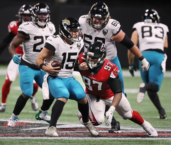 Falcons defensive tackle Grady Jarrett sacks Jacksonville Jaguars quarterback Gardner Minshew.  Curtis Compton/ccompton@ajc.com