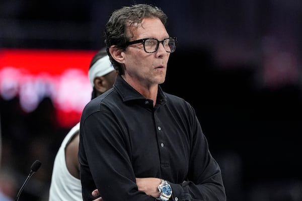 Atlanta Hawks head coach Quin Snyder watches play against the Oklahoma City Thunder during the first half of an NBA basketball game, Friday, Feb. 28, 2025, in Atlanta. (AP Photo/Mike Stewart)