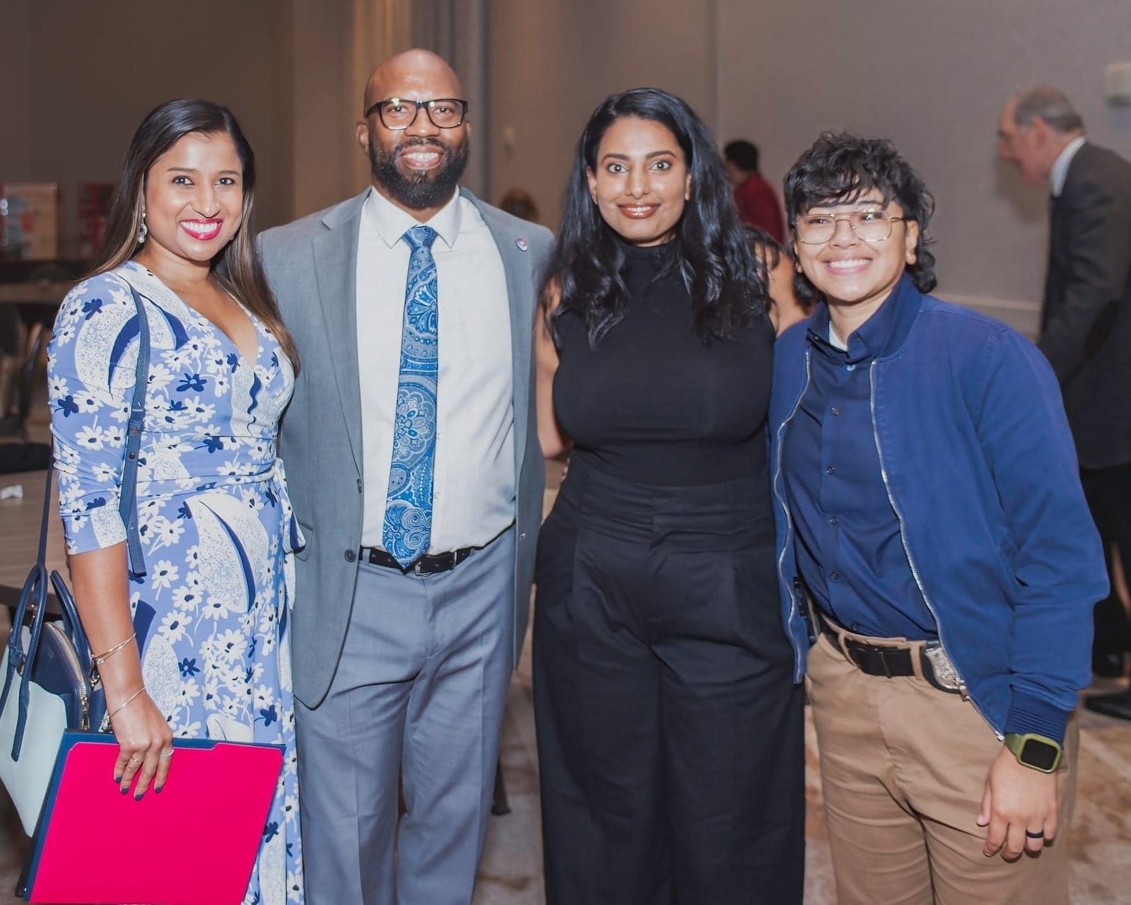 From left to right: Dr. Anita Mallya, Willie Hatchett, Dr. Komal Paladugu and Atlanta police officer Melina Lim. The doctors and Lim helped save Hatchett’s life when he went into cardiac arrest early in the running of The Atlanta Journal-Constitution Peachtree Road Race on July 4, 2022. Hatchett met them during a ceremony of Better Outcomes, a health and safety training and education organization, on Oct. 13, 2022. (Photo courtesy of Michael Charles/Better Outcomes)