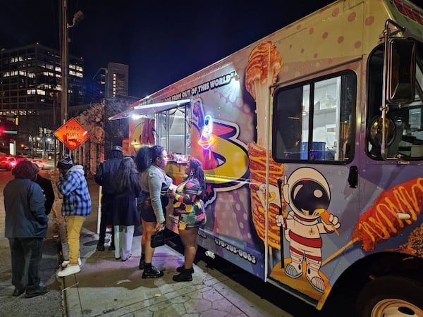 Patrons from MJQ Concourse stand by a food truck after the closing party on Jan. 25. (Christopher Daniel/AJC)