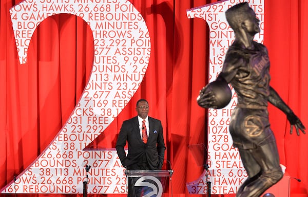 Dominique Wilkins speaks as his statue is unveiled at Philips Arena on Thursday, March 5, 2015. HYOSUB SHIN / HSHIN@AJC.COM