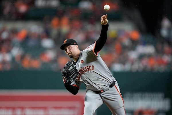 FILE - San Francisco Giants starting pitcher Blake Snell delivers during the first inning of a baseball game against the Baltimore Orioles, Sept. 17, 2024, in Baltimore. (AP Photo/Stephanie Scarbrough, File)