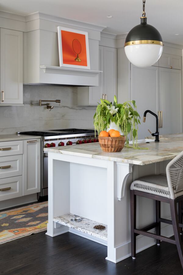 Many homeowners are integrating pet feeding stations into their kitchen designs.
(Courtesy of Hope Austin Interiors / Laura Negri Photography)