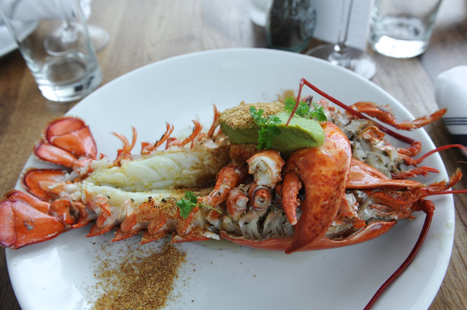 Whole Maine Lobster with whipped English peas, Meyer lemon brioche crumble, lobster butter. (BECKY STEIN PHOTOGRAPHY)