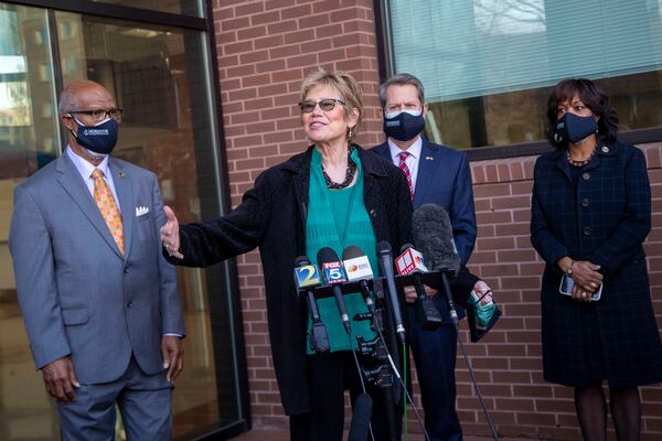 Georgia Department of Public Health Commissioner Dr. Kathleen Toomey answers questions last month at a press conference attended by Rep. Calvin Smyre (D-Columbus), left, Morehouse School of Medicine President and Dean Dr. Valerie Montgomery Rice, right, and Gov. Brian Kemp. (Alyssa Pointer / Alyssa.Pointer@ajc.com)