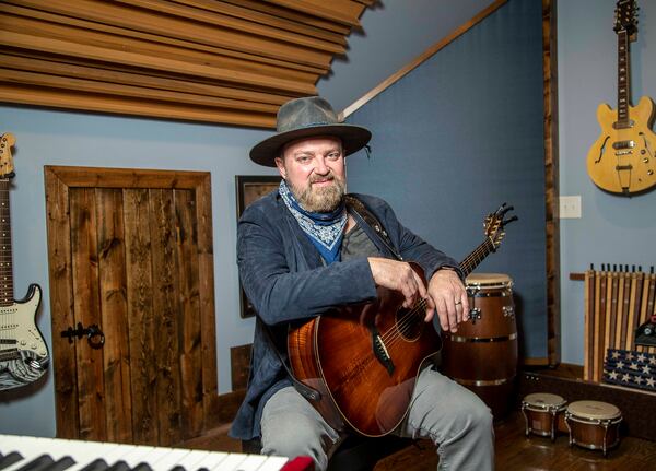 02/04/2021 —Sandy Springs, Georgia —  Musician John Driskell Hopkins sits for a portrait at his studio in Sandy Springs, Thursday, February 4, 2021. (Alyssa Pointer / Alyssa.Pointer@ajc.com)