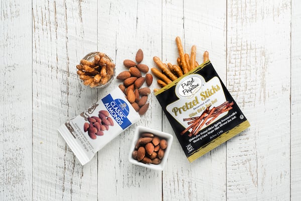  Delta's new snacks include almonds, as well as olive oil and sea salt pretzels. Source: Delta Air Lines