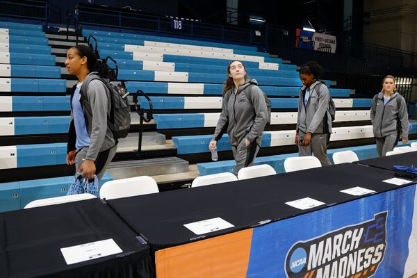 Columbia players look around as they arrive at Carmichael Arena on the campus of the University of North Carolina in Chapel Hill, N.C., Wednesday, March 19, 2025, before their First Four basketball game in the NCAA Tournament against Washington on March 20. (AP Photo/Nell Redmond)