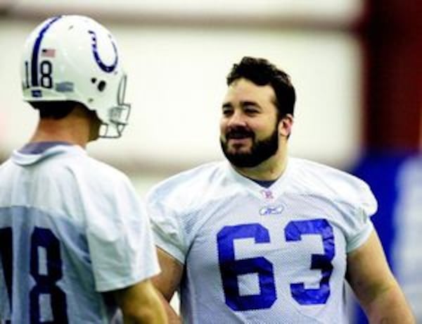 Indianapolis Colts center Jeff Saturday, right, talks with quarterback Peyton Manning during practice before Super Bowl XLI in Indianapolis in 2007. Michael Conroy / The Associated Press The Associated Press