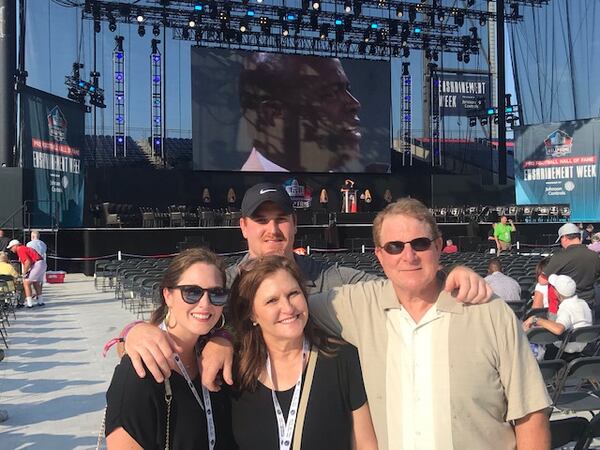 Former Falcons tight end coach Chris Scelfo (right) with his wife Nancy at Pro Football Hall of Fame last August for the induction ceremony of Tony Gonzalez. (Courtesy of Chris Scelfo)