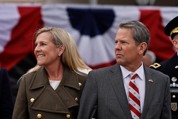 Gov. Brian Kemp and his wife Marty smile at supporters outside Georgia State University Convocation Center  following his inauguration on Thursday, January 12, 2023.  (Natrice Miller/natrice.miller@ajc.com)    