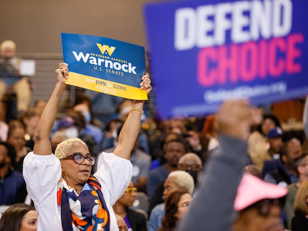 Voters cheer at a campaign event in Atlanta where President Barack Obama will campaign for gubernatorial candidate Stacey Abrams, U.S. Sen. Raphael Warnock, and other Democrats on Friday, October 28, 2022.   (Arvin Temkar / arvin.temkar@ajc.com)