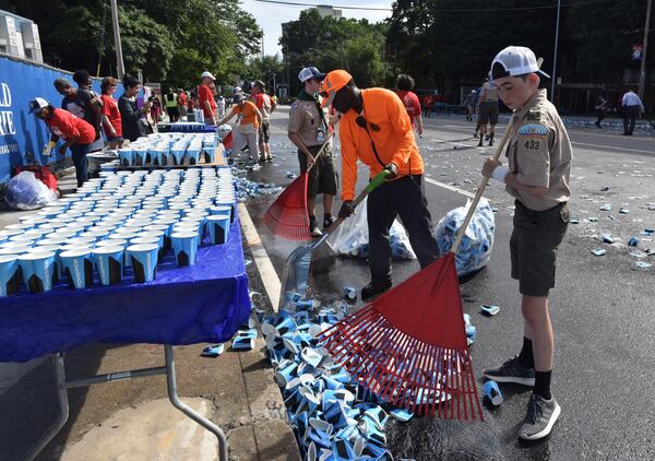 Volunteers have begun cleaning up near the Shepherd Center as the 50th annual AJC Peachtree Road Race nears its end.