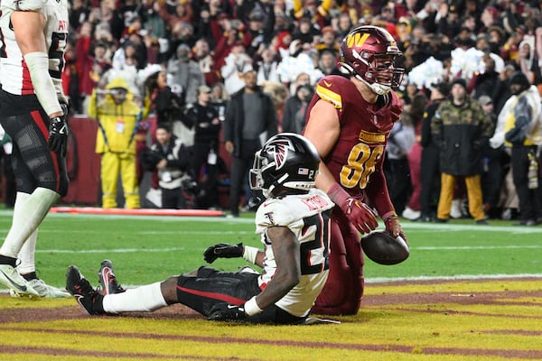 Washington tight end Zach Ertz beats Atlanta's Dee Alford for the winning touchdown in overtime.