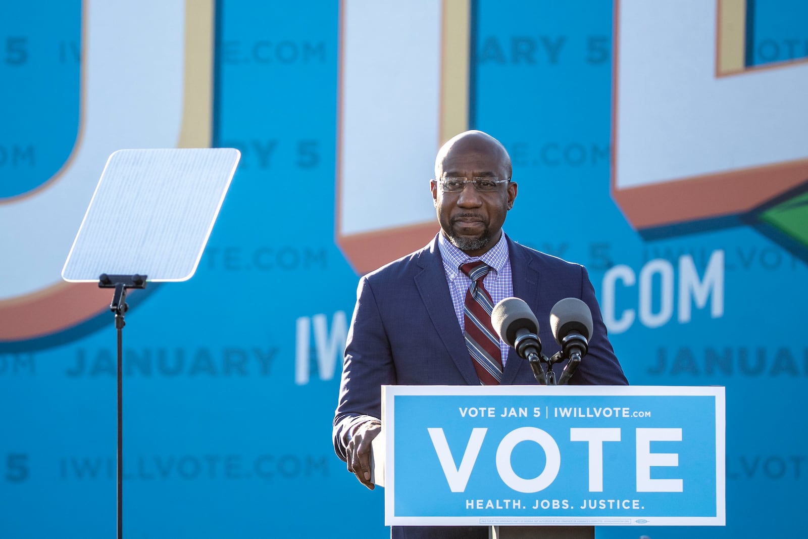 U.S. Senate Democrat candidate Rev. Raphael Warnock makes remarks during a Georgia Democrat U.S. Senate campaign rally in Atlanta’s Summerhill neighborhood, Monday, January 4, 2021. (Alyssa Pointer / Alyssa.Pointer@ajc.com)