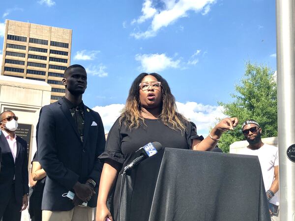 Tiffany Roberts, right, of JUST Georgia, and the Rev. James Woodall, president of the Georgia NAACP, speak Sunday, May 31, 2020, at Liberty Plaza near the Georgia State Capitol at a press conference condemning the arrests of of Messiah Young and Teniyah Pilgrom. J. SCOTT TRUBEY/STRUBEY@AJC.COM