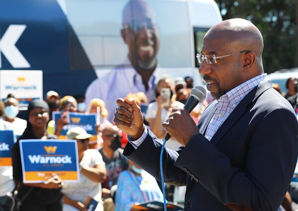 U.S. Sen. Raphael Warnock, above, and U.S. Rep. Barry Loudermilk, R-Cassville, are teaming up to lead an effort to land new aircraft at Dobbins Air Reserve Base in Marietta. Warnock is pictured at a campaign event in Atlanta on Sept. 26, 2022. (Curtis Compton / AJC)