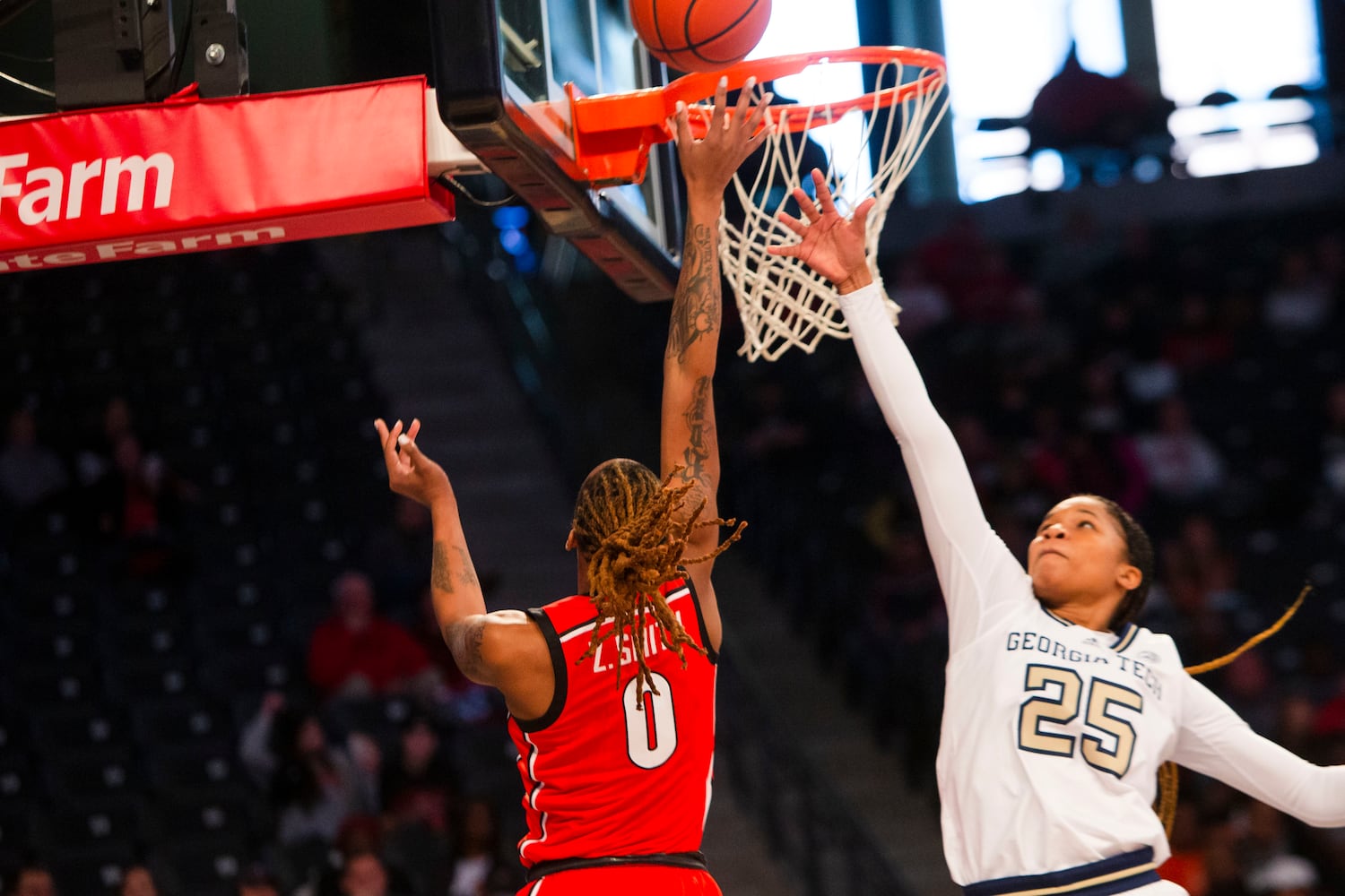 Georgia forward Zoesha Smith shoots the ball during a women's basketball game against Georgia Tech on Sunday in Atlanta. (CHRISTINA MATACOTTA / FOR THE ATLANTA JOURNAL-CONSTITUTION)