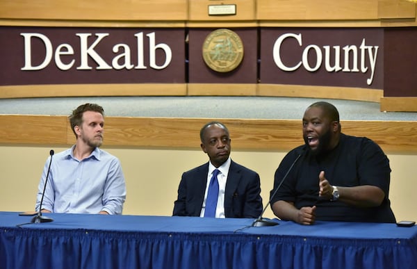 Michael Thurmond (center), on July 7, 2016, four months before being elected the new CEO of DeKalb County. He listens, along with Clarkston Mayor Ted Terry (left), as rapper Killer Mike speaks during a town hall meeting in Decatur. After taking office, Thurmond told The AJC that when he campaigned, voters told him they were tired of DeKalb being in the news because of scandals. HYOSUB SHIN / HSHIN@AJC.COM