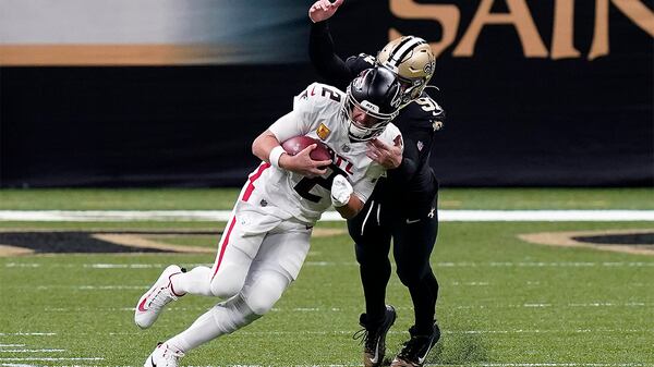 Saints defensive end Trey Hendrickson (91) sacks Falcons quarterback Matt Ryan (2) in the first half Sunday, Nov. 22, 2020, in New Orleans. (Butch Dill/AP)