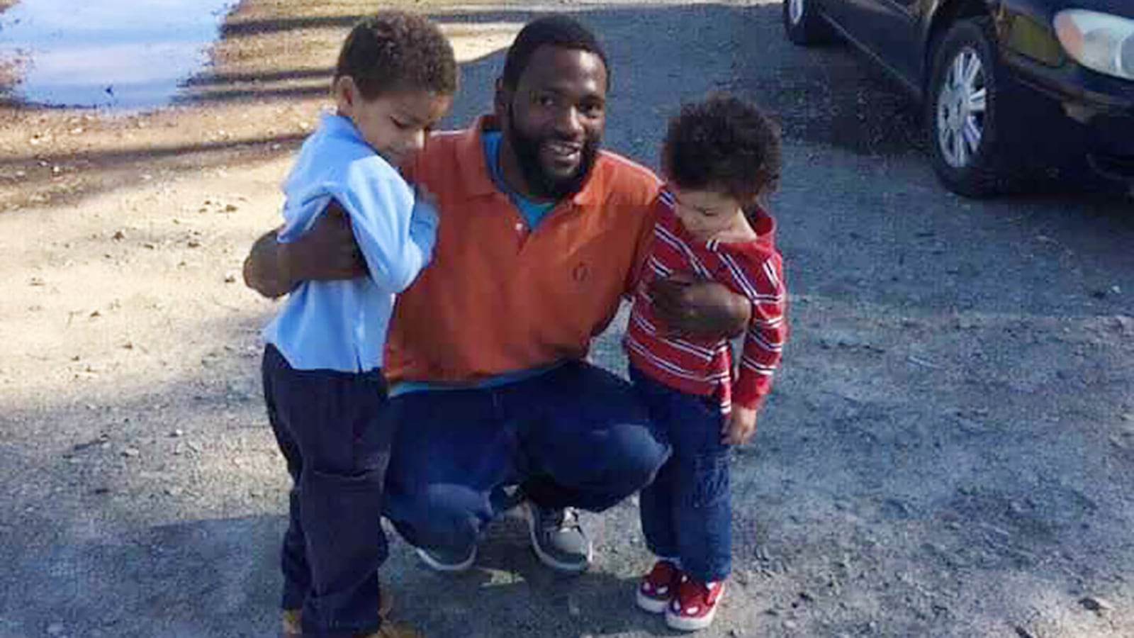 Antonio May poses with his sons Za'Kobe and Jordan Rickerson in 2015.