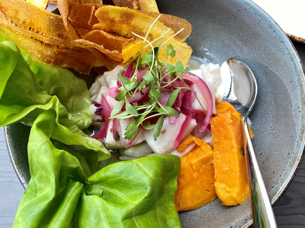 A closeup of El Vinedo Local’s Victoriano ceviche — fresh white fish, sweet potatoes and onion, with ultra-thin and crispy plantain chips.
Wendell Brock for The Atlanta Journal-Constitution