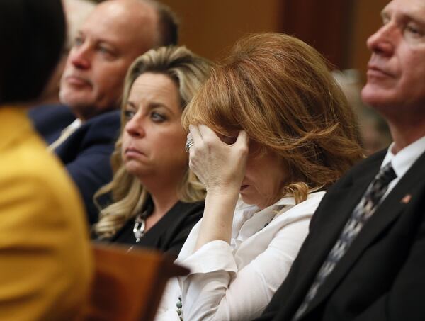 4/17/18 - Atlanta - Dani Jo Carter reacts as Defense co-counsel Don Samuel makes final arguments for the defense today during the Tex McIver murder trial at the Fulton County Courthouse. Bob Andres bandres@ajc.com