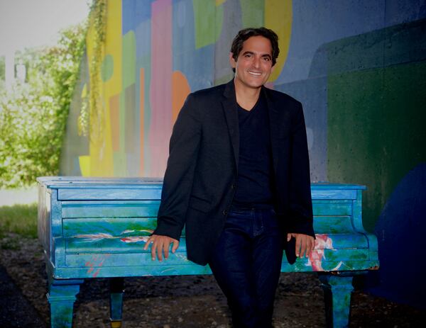 Volunteer artists paint the pianos designated for the Pianos for Peace program. The Atlanta-based program places and maintains pianos in public spaces so that anyone can play them.