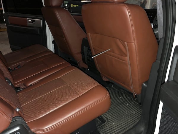 4/16/18 - Atlanta - The interior of McIvers’ Ford Expedition, where the shooting took place, with a wooden dowel tracing the path of the bullet, in the basement of the courthouse after the jury had a chance to look at it during the Tex McIver murder trial at the Fulton County Courthouse on Thursday, April 12, 2018. PHOTO COURTESY OF THE FULTON COUNTY SHERIFF’S DEPARTMENT