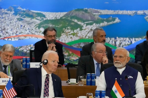 U.S. President Joe Biden, left, and India's Prime Minister Narendra Modi attend the G20 Summit leaders meeting in Rio de Janeiro, Tuesday, Nov. 19, 2024. (AP Photo/Eraldo Peres)