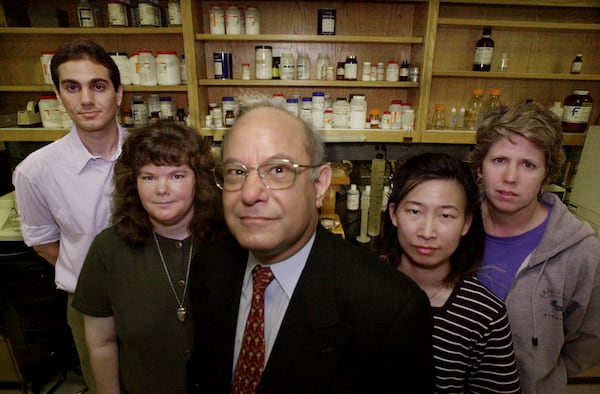 Left to right: Shehab Hashim, a graduate student working on Ph.D. in Molecular Genetics (from Egypt); Dr. Iris Porat (from Israel) who is doing post-doctoral work in Molecular Genetics; Dr. Ahmed Abdelal Dean of the College of Arts & Sciences at GSU; Dr. Hsiuchin Yang (from Taiwan) who is doing post-doctoral work in Molecular Genetics: and Debby Walthall, (from USA) Research Technician in Molecular Microbial Genetics. They are pictured in the Molecular Genetics lab at Georgia State University in downtown Atlanta. (Kimberly Smith/staff)