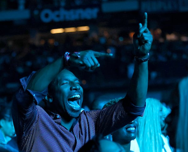 Atlanta mayor Andre Dickens enjoys the performance of  artist Jermaine Dupri, during his "The South Got Something to Say" show at the Caesars Superdome in New Orleans. The Essence Festival is celebrating its 29th year, and the 50th anniversary of hip-hop. TYSON HORNE / THORNE@AJC.COM