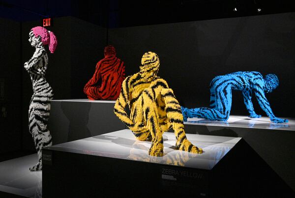 Lego sculptures in “Humanity” room at "Art of the Brick Immersive Experience" exhibition at Exhibition Hub Atlanta Art Centre, Wednesday, April 19, 2023, in Doraville. The exhibition will feature many pieces and themes, including a room with oversized sculptures (25-foot long), over 70 works of art crafted from more than 1 million LEGO bricks, galleries celebrating human-kind and nature, and a short documentary about how Nathan creates his works. (Hyosub Shin / Hyosub.Shin@ajc.com)