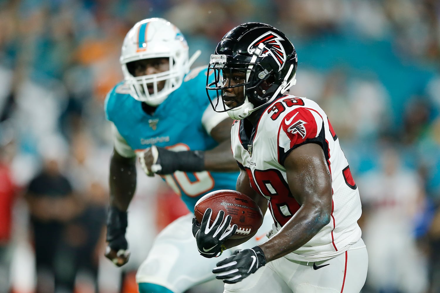 Photos: Falcons stars sit out exhibition with Dolphins