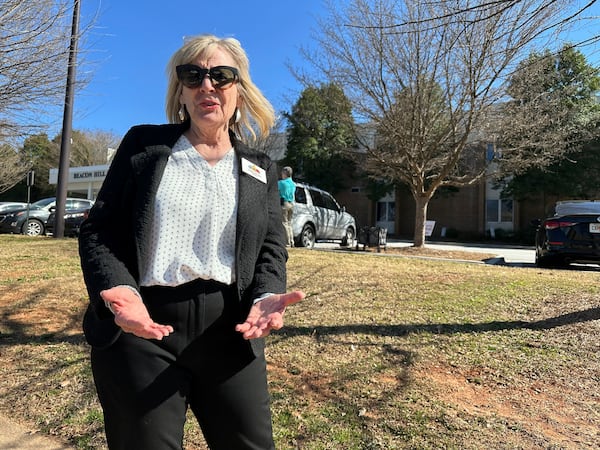 Decatur Mayor Patti Garrett talks about an automated speed camera outside Beacon Hill Middle School in Decatur, Ga., on Tuesday, Feb. 25, 2025. (AP Photo/Jeff Amy)