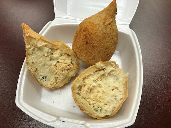  Coxinha is a Brazilian-style chicken croquette. 