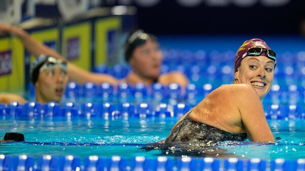 Allison Schmitt reacts after winning her heat in the Women's 200 Freestyle during wave 2 of the U.S. Olympic Swim Trials Tuesday, June 15, 2021, in Omaha, Neb. (Jeff Roberson/AP)