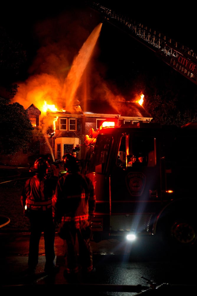 Marietta fire department responded early Tuesday morning to a house fire on Autumn Chase court in Marietta. Units from Cobb and Marietta fire department quickly knocked down the blaze. (Ben Hendren for the Atlanta Journal Constitution)