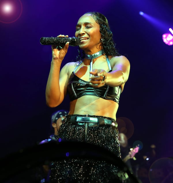 TLC's Chilli Thomas spoke often with the crowd about playing a hometown show. The group was part of a lineup with Nelly and Flo Rida at Cellairis Amphitheatre at Lakewood. Photo: Robb Cohen Photography & Video /RobbsPhotos.com