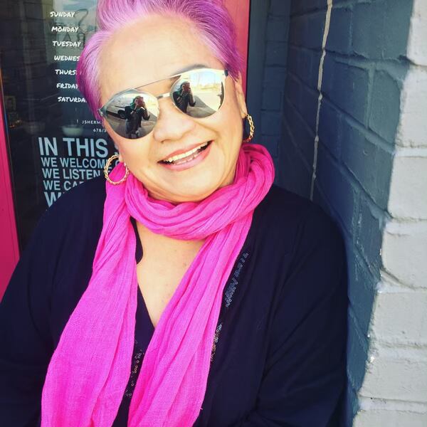 In a recent photo, Betty Hsu poses after having colored her hair hot pink. A visit to the High Museum of Art to see Japanese artist Yayoi Kusama’s “Infinity Mirrors” inspired Hsu’s eccentric side, and reignited her love of art. She painted more than 100 pieces for an art exhibit, but was too ill to attend the show. CONTRIBUTED BY HOWARD HSU