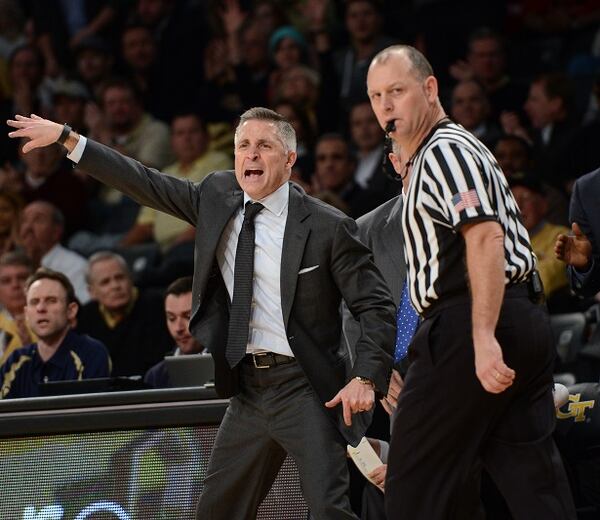 Georgia Tech head coach Brian Gregory directs his team during the second half of an NCAA college basketball game, Monday, Feb. 23, 2015, in Atlanta. Louisville won 52-51. (AP Photo/Jon Barash) This wouldn't appear to be a signal for a timeout. (John Barash/AP photo)